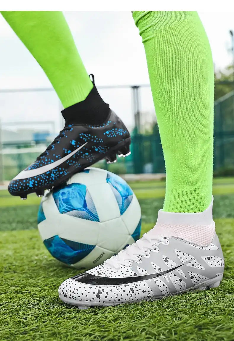 black white model on field soccer cleats