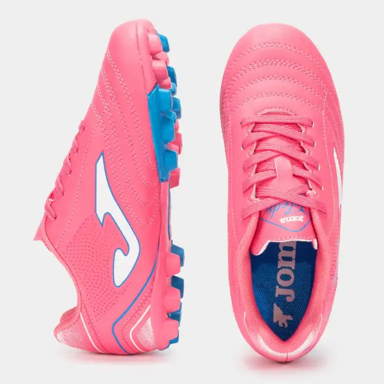 Pink soccer shoes with blue accents on top view