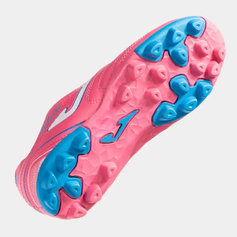 Close-up of pink soccer cleats with blue studs