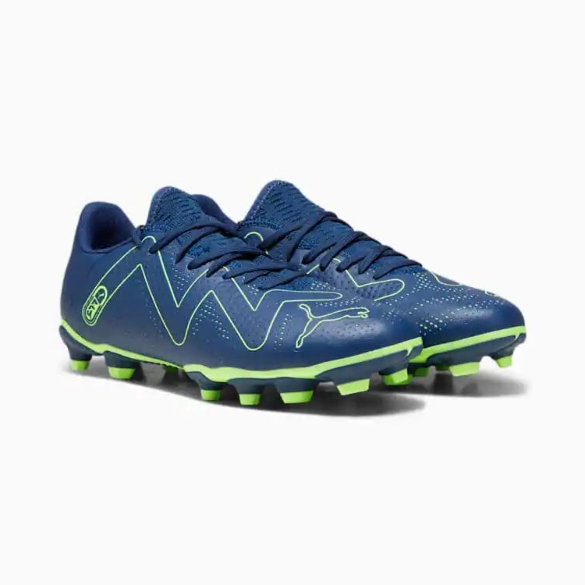 Puma Kids Soccer cleats with green accents
