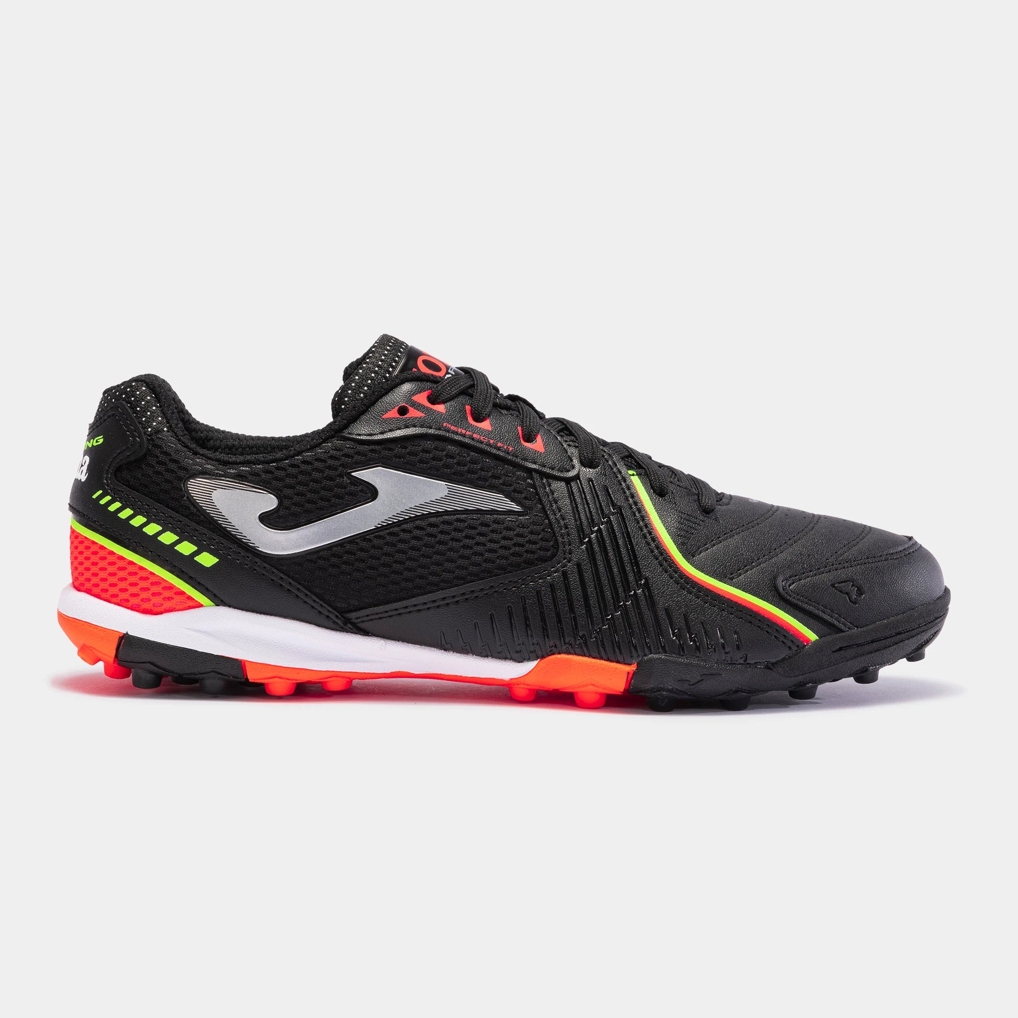 Joma Dribling 2301 black turf soccer shoes worn on synthetic field – demonstrating fit, comfort, and performance grip.