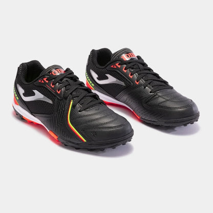 Joma Dribling 2301 turf soccer shoes in black – side view showing durable synthetic upper and rubber outsole for turf play.
