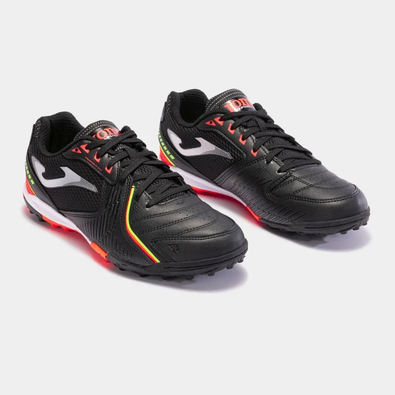 Joma Dribling 2301 turf soccer shoes in black – side view showing durable synthetic upper and rubber outsole for turf play.