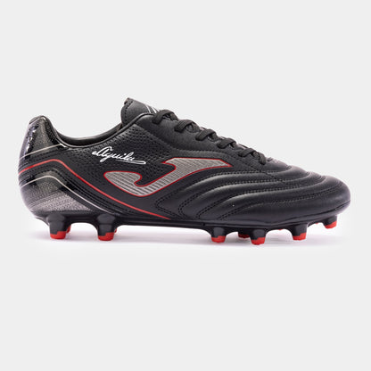 A black and red Joma Aguila men/women firm ground cleat with a synthetic leather upper and a rubber sole.