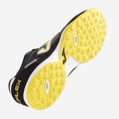 Joma Top Flex 2301 yellow soccer shoes – detailed view of rubber turf outsole with short studs for traction on synthetic surfaces.