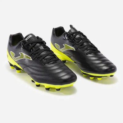 A pair of Joma Numero-10 S firm ground cleats for soccer, predominantly black with yellow accents, displayed against a white background.