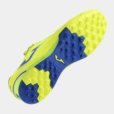 Joma Dribling 2409 yellow soccer shoes – bottom view of rubber turf outsole with short studs for traction on synthetic surfaces.