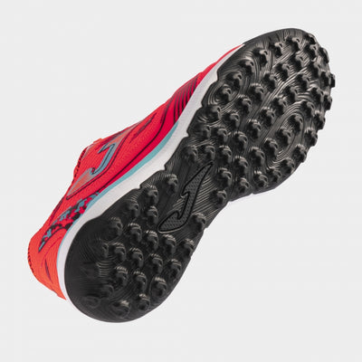Joma Liga 5 2408 orange soccer shoes – bottom view of rubber turf outsole with short studs for traction on synthetic surfaces.