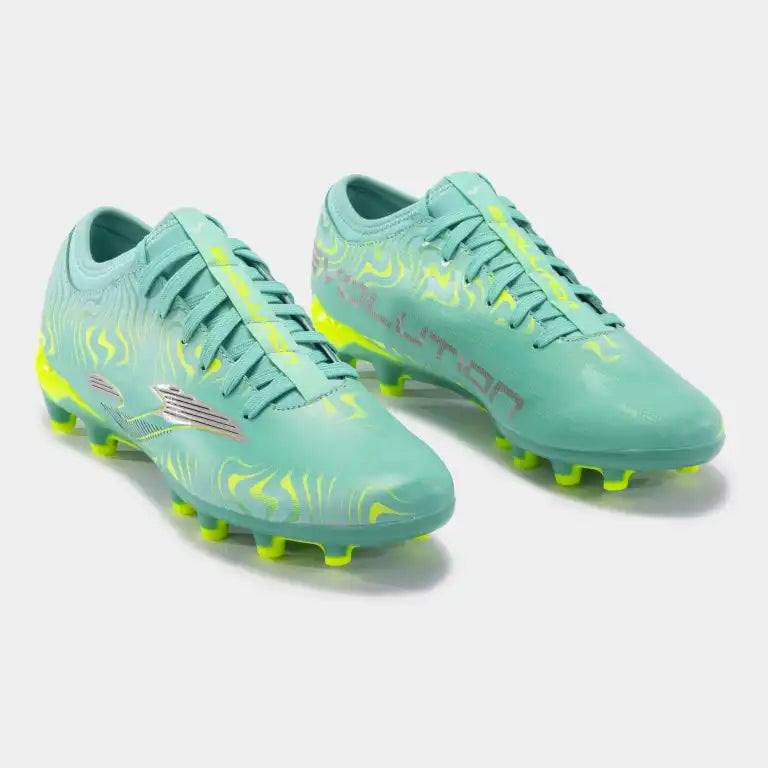 Lightweight Joma Evolution 2415 firm ground soccer women's cleats in turquoise