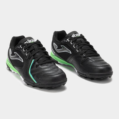 Joma Dribling 2501 black soccer shoes – bottom view of rubber turf outsole with short studs for grip on synthetic fields