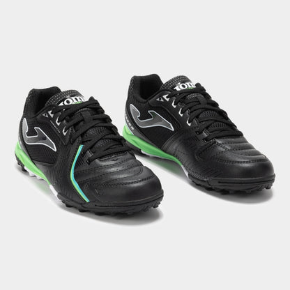 Joma Dribling 2501 black soccer shoes – bottom view of rubber turf outsole with short studs for grip on synthetic fields