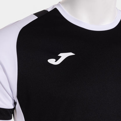 Black and white sports jersey with a logo on a mannequin