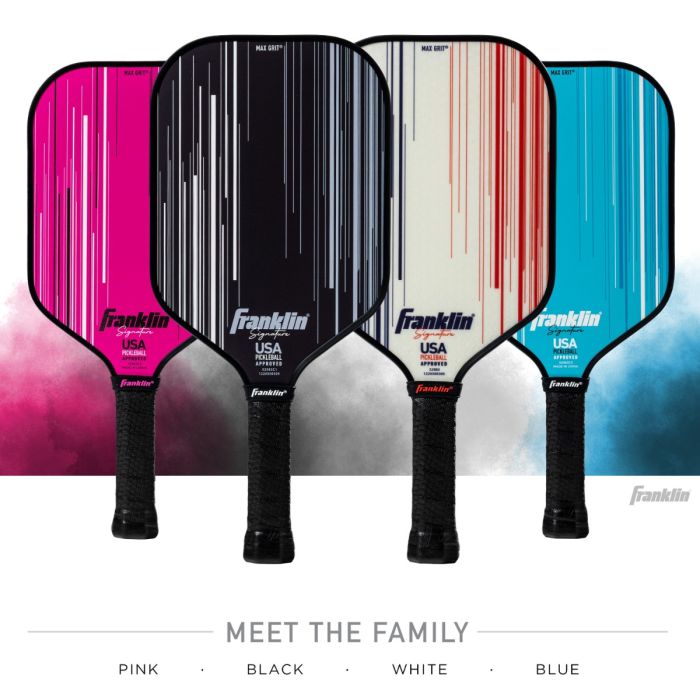 Four Franklin pickleball paddles in pink, black, white, and blue on a gradient background.
