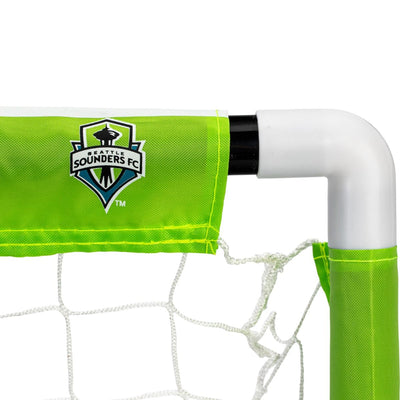 Soccer goal with Seattle Sounders FC logo on a green net