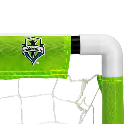 Soccer goal with Seattle Sounders FC logo on a green net
