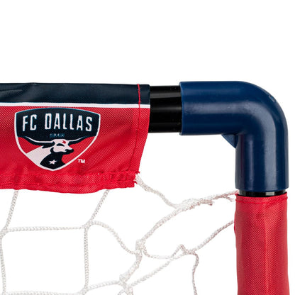 Red and blue sports goal with FC Dallas logo on a white background